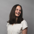 Headshot of Elaine Hoffman with dark gray background