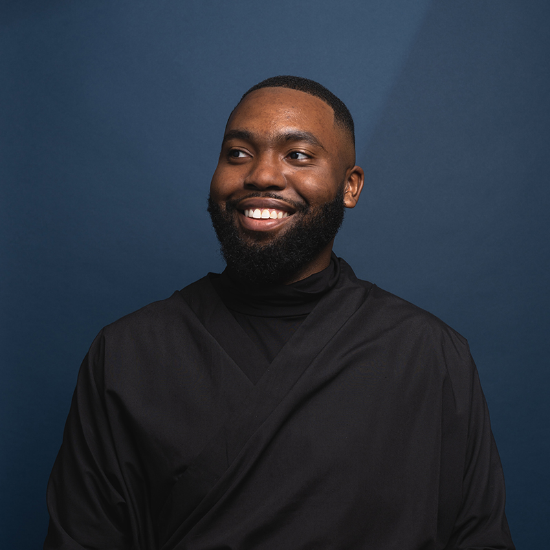 Headshot of Jackey Robinson with blue background